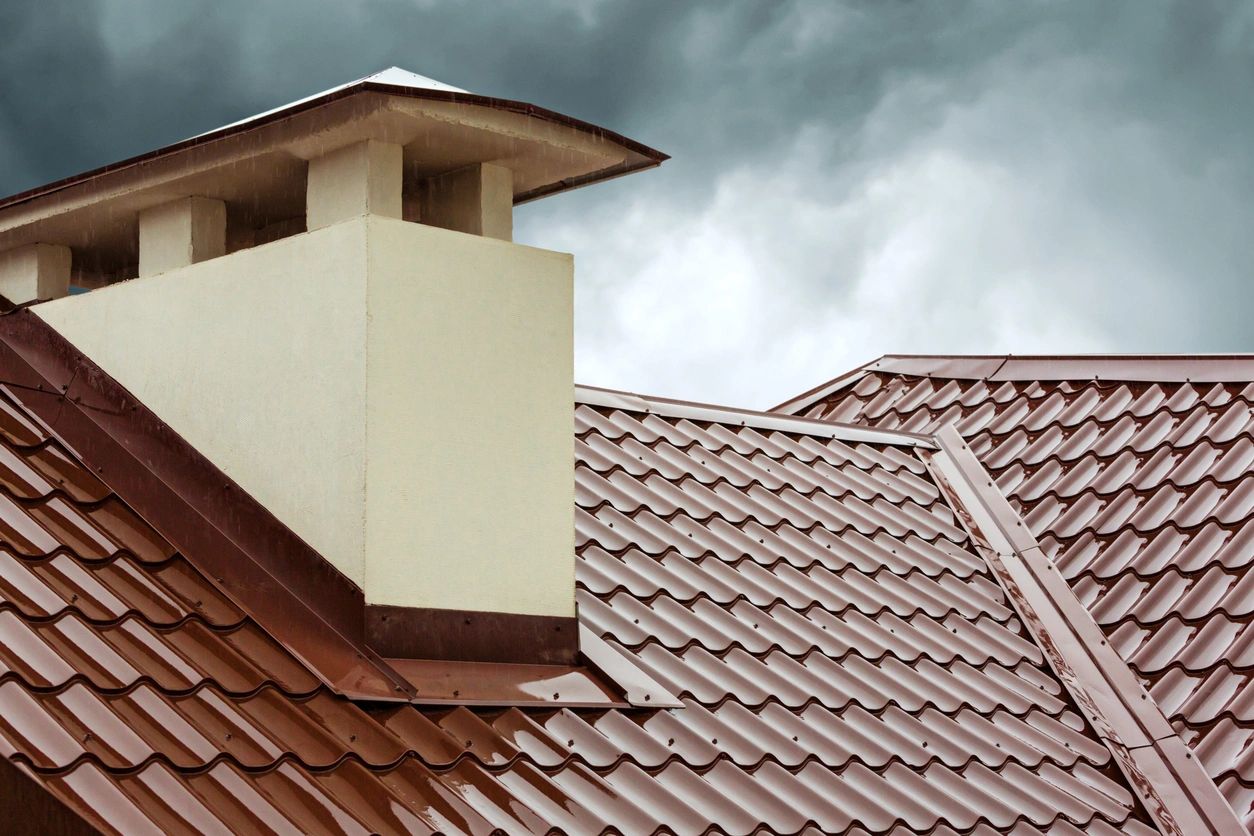 A brown roof with a white chimney on top of it.